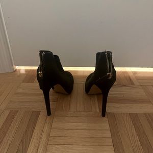 Nine West, size 8 black stiletto ankle heels.